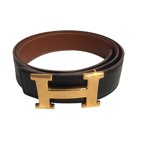 black hermes belt gold buckle.